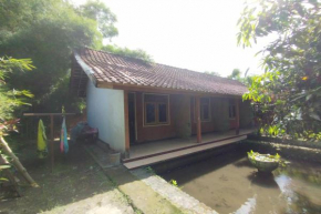 SPOT ON 93640 Dannis Homestay Near Musholla Al Istiqomah Terawangan